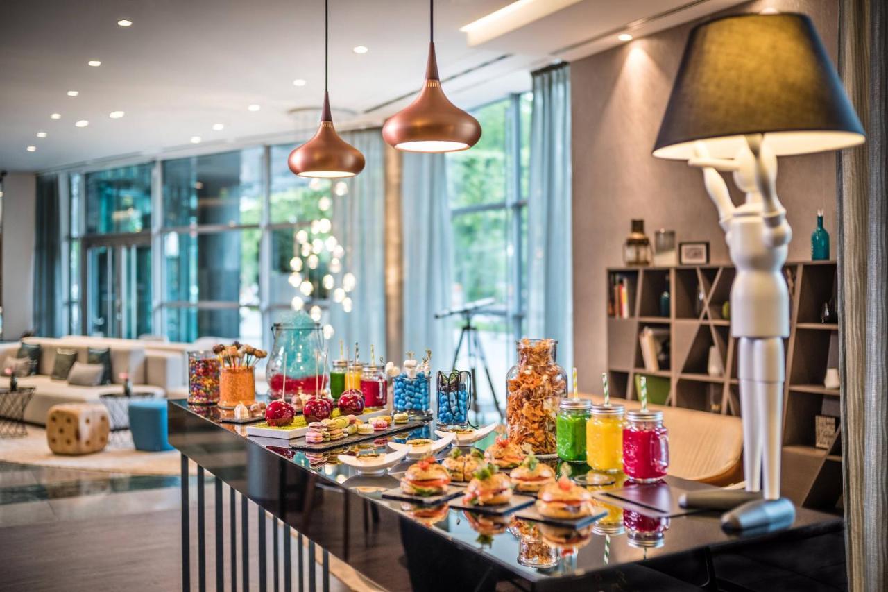เลอ เมริเดียน ฮัมบวร์ค Hotel ฮัมบูร์ก ภายนอก รูปภาพ The Lounge at the airport